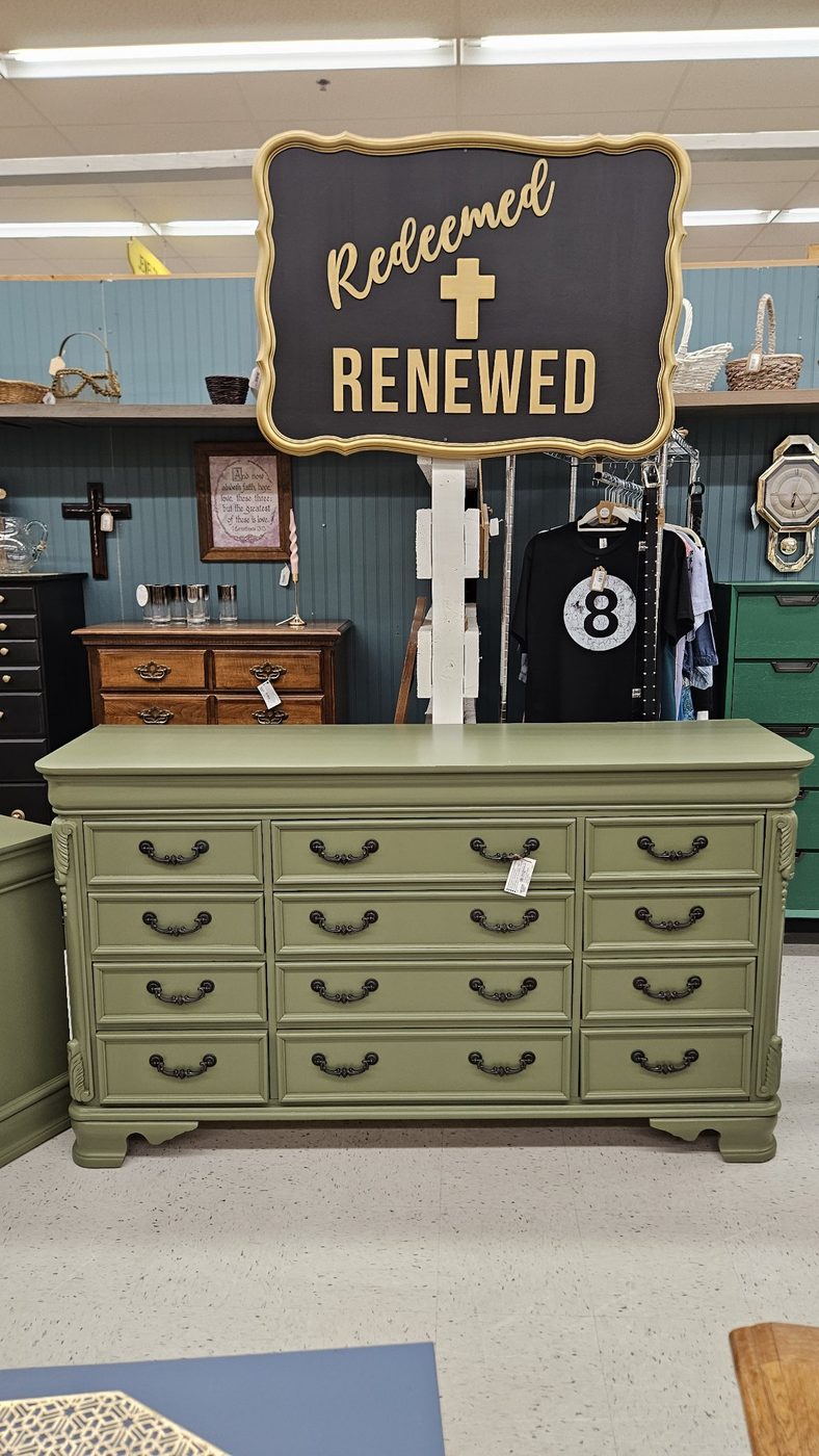 Olive green refinished twelve-drawer dresser at the Redeemed & Renewed booth